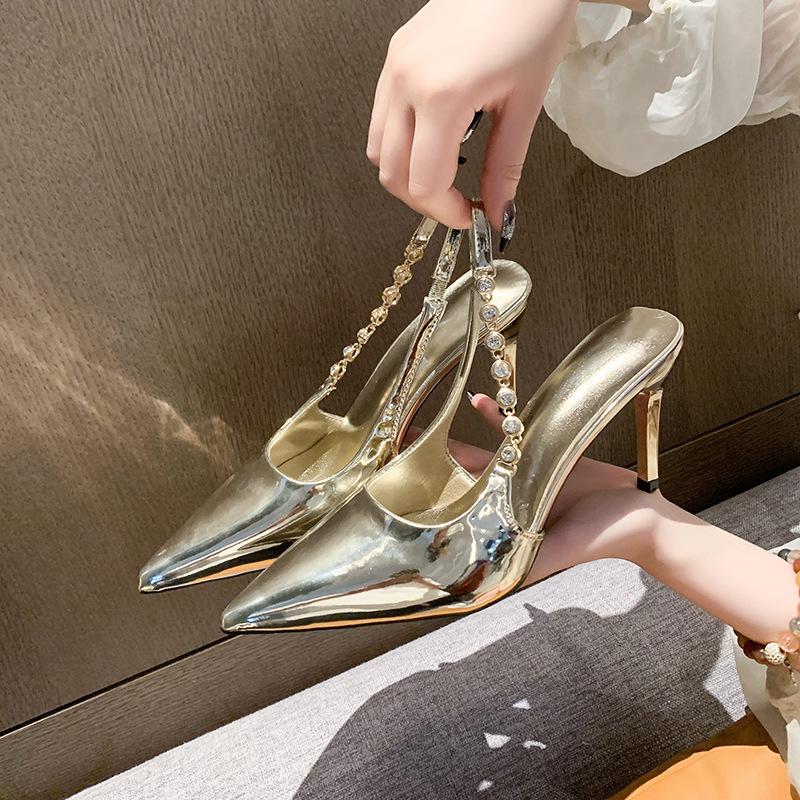 

Summer 2025 new pointed head shallow mouth rhinestone patent leather silver high heels thin heel versatile word with bag head sandals 42
