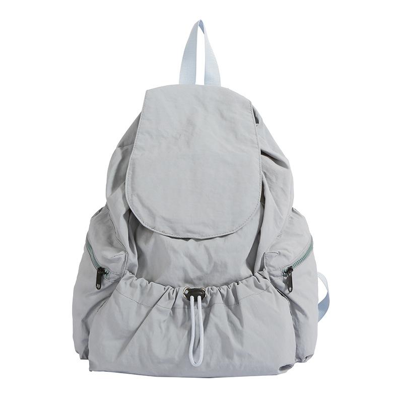 Korean version of fashionable nylon solid color schoolbag spring new versatile lightweight travel bag large capacity student bag women