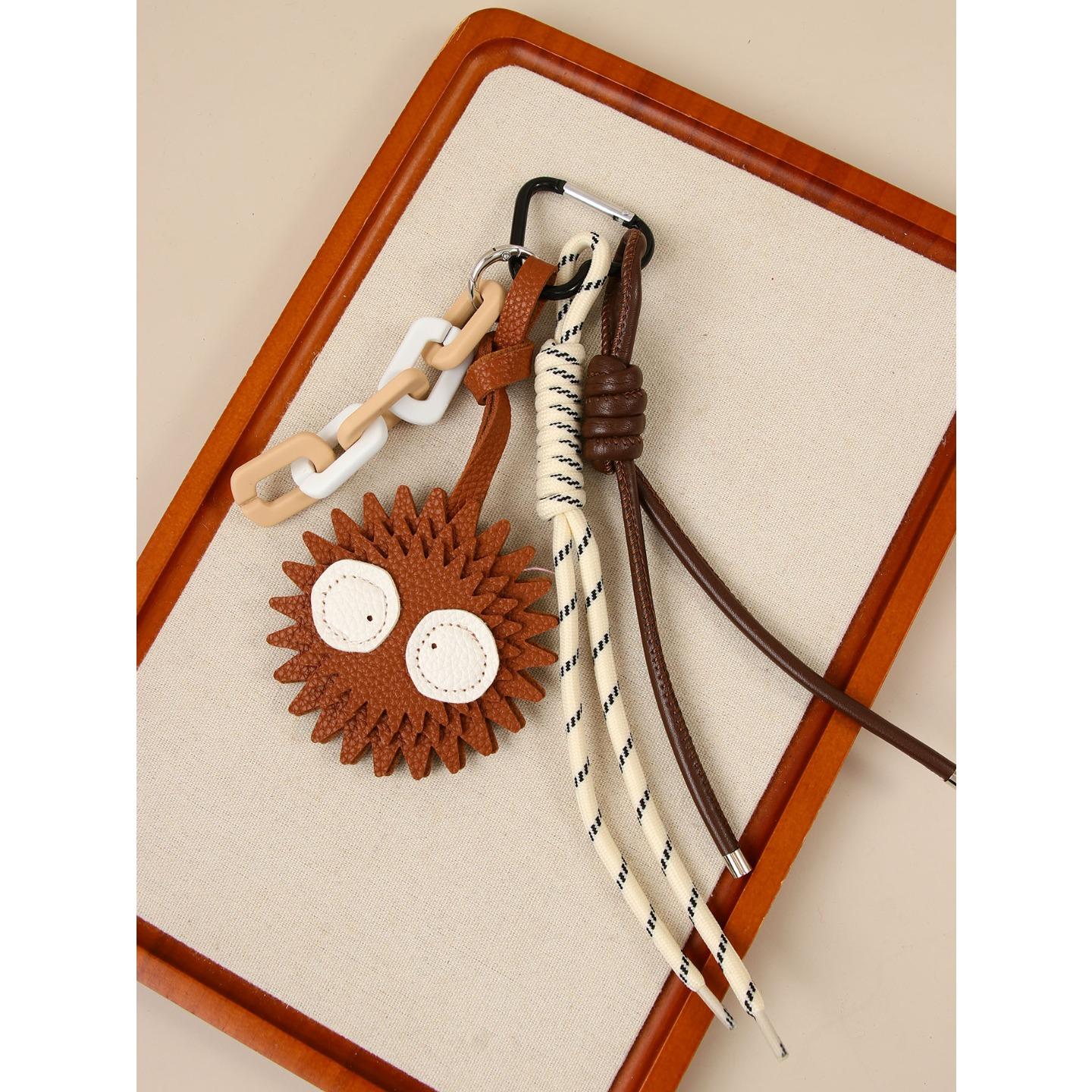 Cross-border cute cartoon ins double-sided briquettes pendant handmade leather bag keychain car pendant коричневый