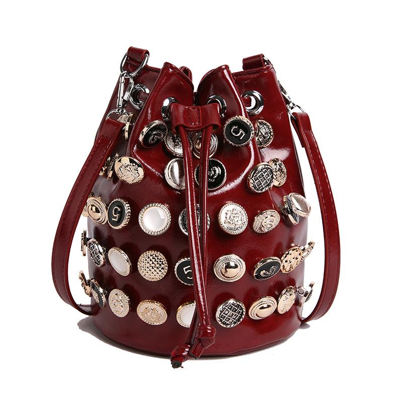 Bag summer 2025 new European and American fashion rivet shoulder bag women's versatile crossbody punk feng shui bucket bag pu