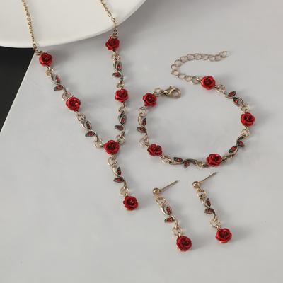 Nischen-Retro-Halskette und Armband mit roten Rosen und Diamanten