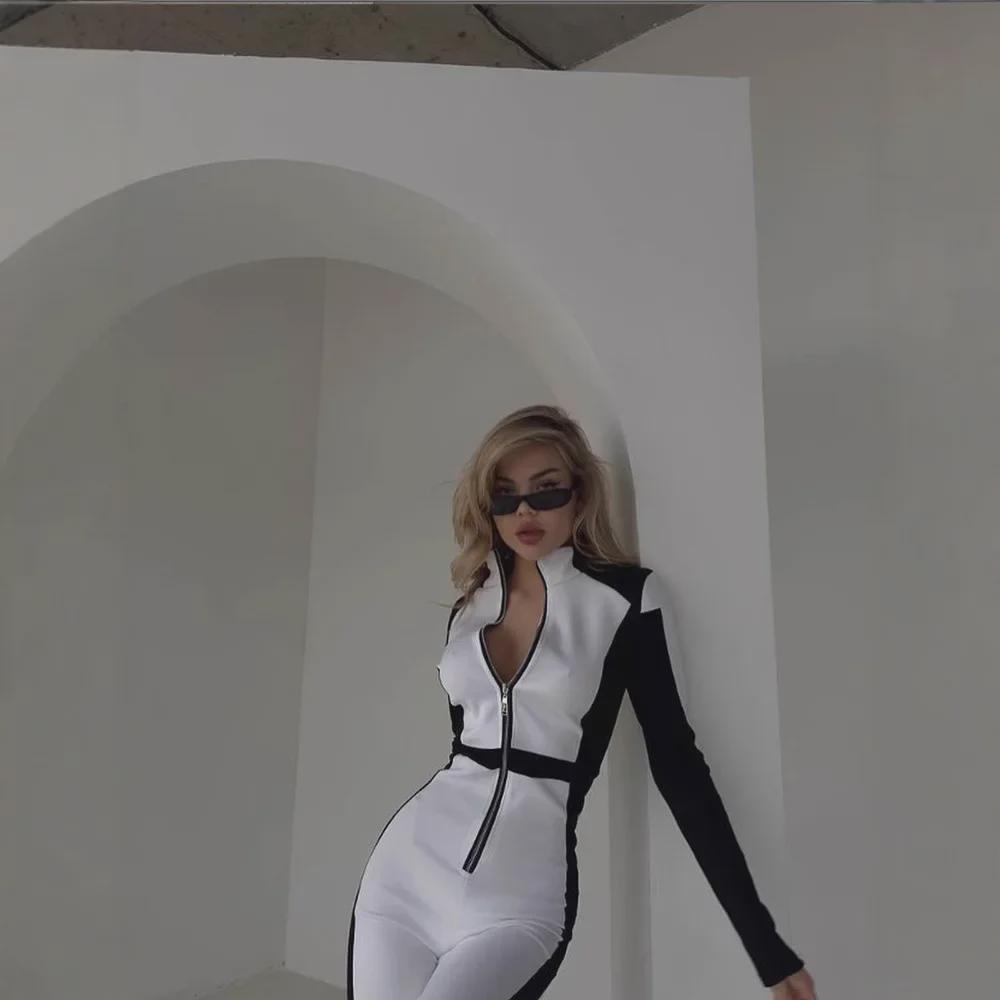 Europejski i amerykański damski kombinezon o dopasowanym kroju i długim rękawie w kontrastowym kolorze