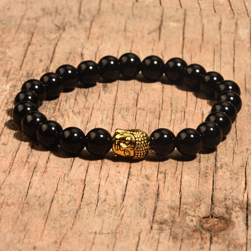 

Браслет из бусин с подвеской-сердцем из розовой зебры, лазурита, розового кварца и белой бирюзы