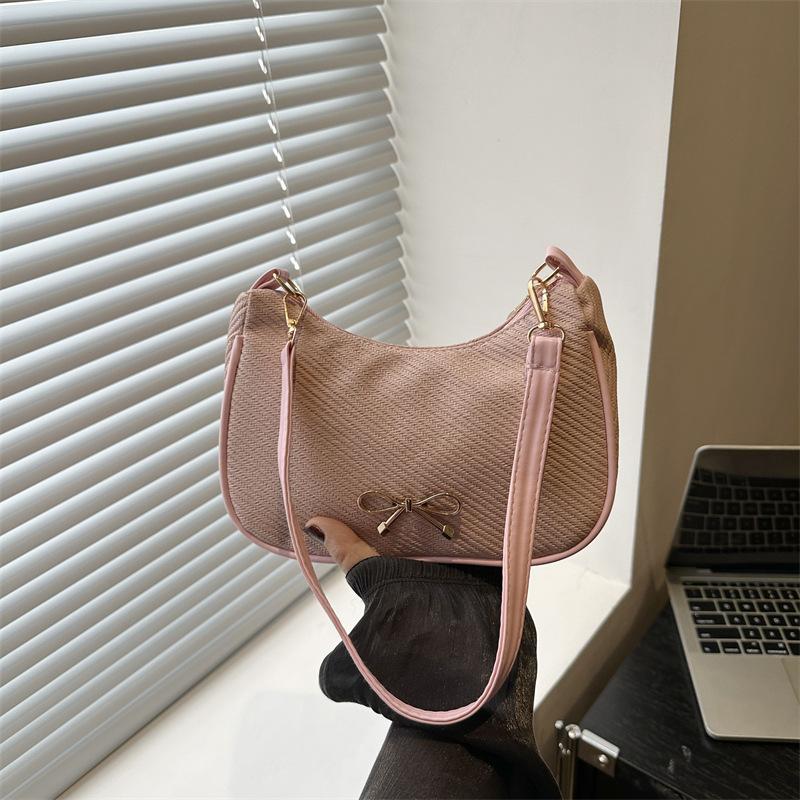 

New fashionable, practical, casual and beautiful bow temperament versatile commuter portable shoulder armpit bag розовый