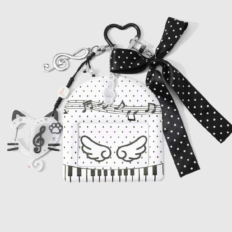 Trendy Musical Note Keyring Key Holder Featuring Piano Keys And Delicate Bowknot Perfect For Music Enthusiasts