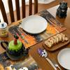 A Set of Four Adorable Halloween Ghosts Featuring Two Black Eyes, These Placemats Are Washable And Perfect for Your Dining Table, Making Them an