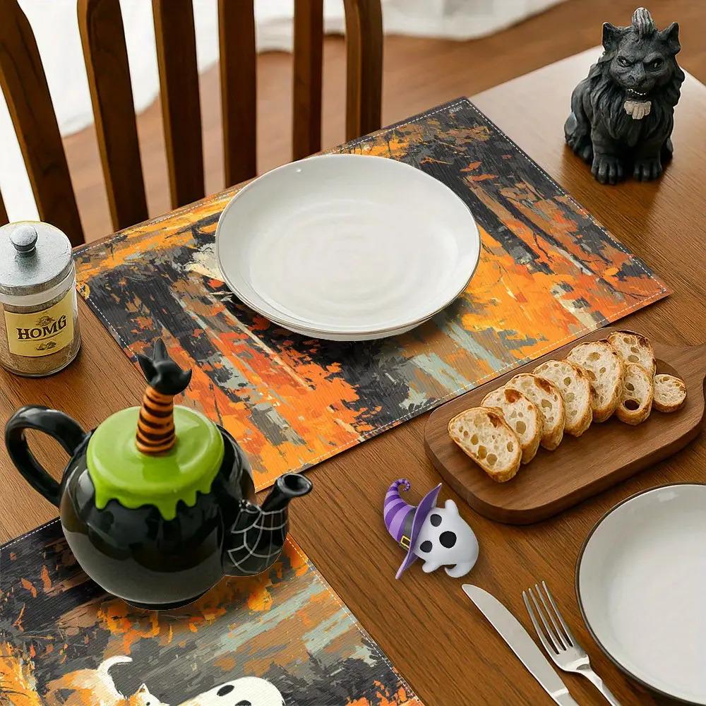 A Set of Four Adorable Halloween Ghosts Featuring Two Black Eyes, These Placemats Are Washable And Perfect for Your Dining Table, Making Them an