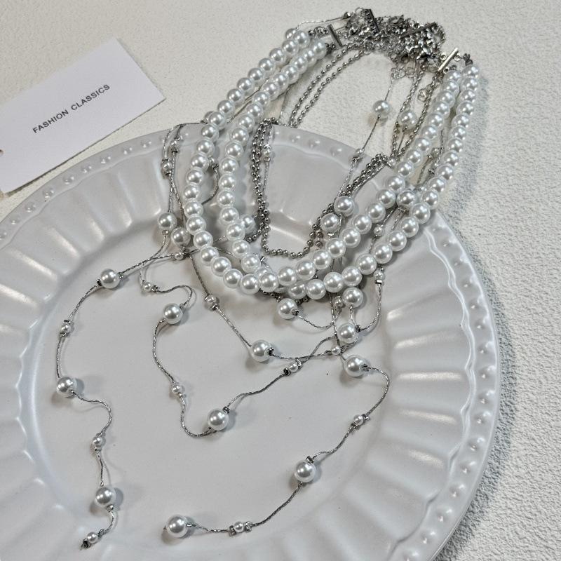 Lekki Luksus Retro Perła Wielowarstwowy Naszyjnik z Długimi Frędzlami do Noszenia w Stosie Damski Trendowy Design Wysokiej Klasy Sens Łańcuszek na Obojczyk