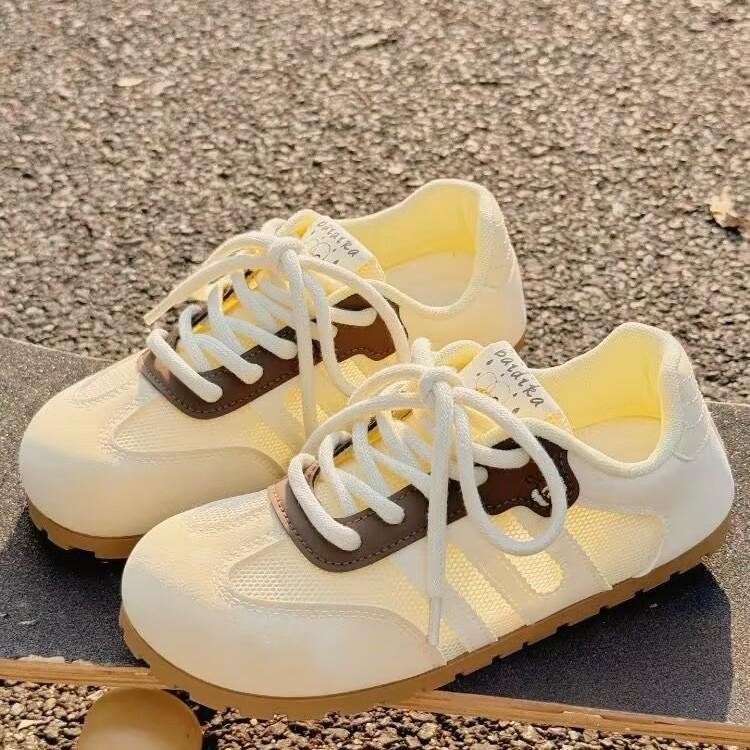 Mesh German training shoes women's 2025 summer new flat bottom not tired feet milk yellow breathable board shoes versatile casual white shoes