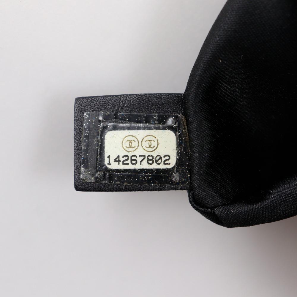 Chanel Saszetka Camelia czarna emalia Kobiety Używana