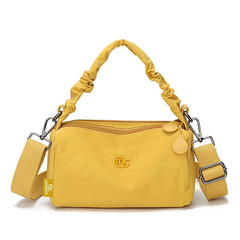 Nylon Waterresistant Bucket Bag For Women With Spacious Interior And Urban Style