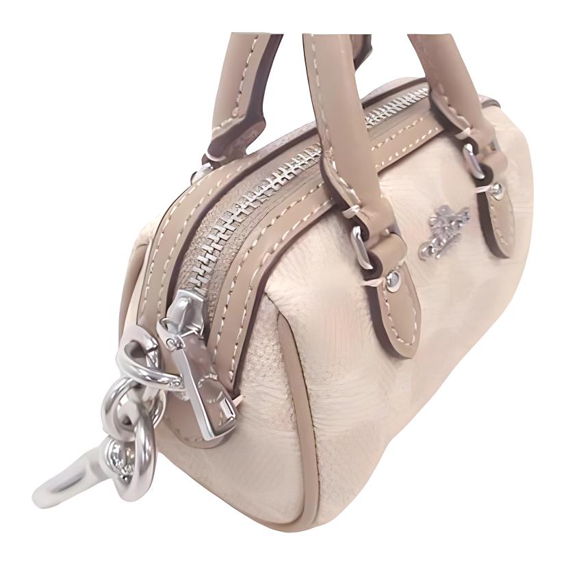 New COACH Coated Canvas Keychain Bag Accessory Trumpets Women's Sand CX068-SVPWH