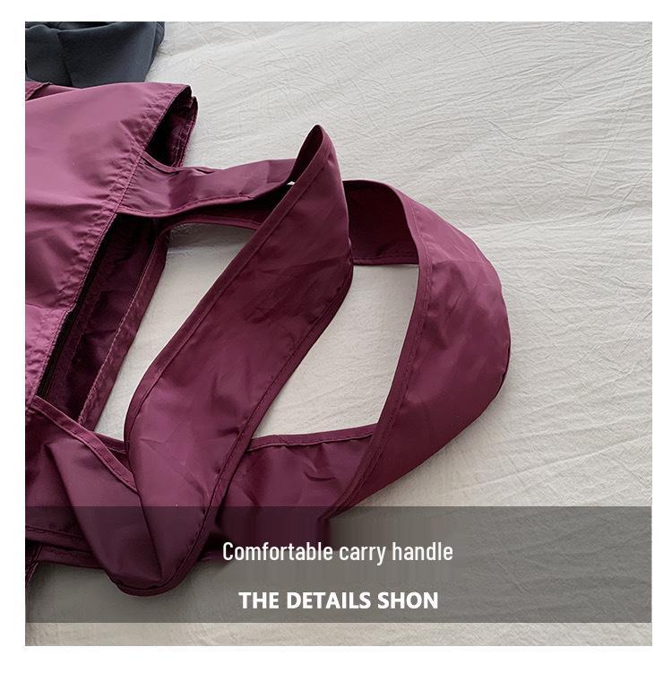 European-American Fashion Large Capacity Travel Bag - Solid Color, Nylon, Handheld or Shoulder Style for Women