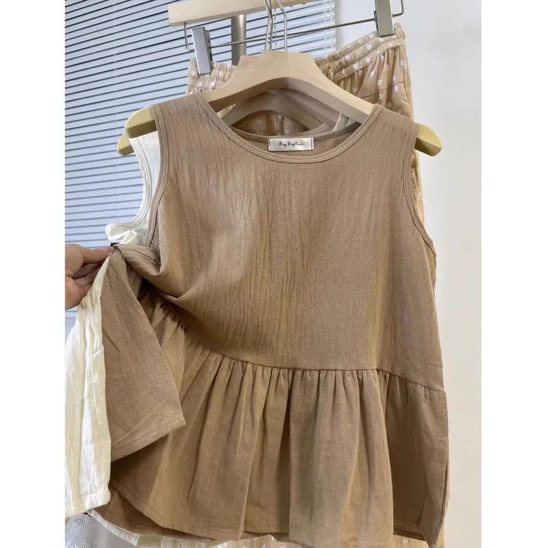Damen Tanktop mit Rundhalsausschnitt, ärmellos, strukturierter Stoff, Schößchensaum, lässige Bluse