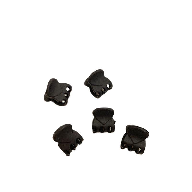 Mini schwarze Krallen-Haarspange für Pony und Dutt