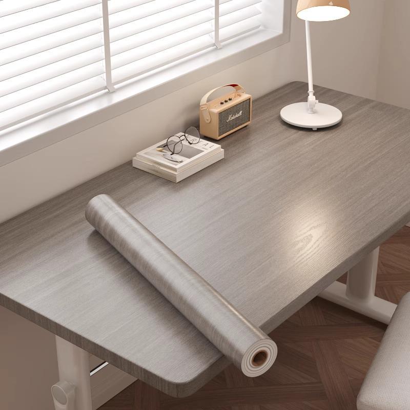 Waterproof Wood Grain Self-Adhesive Table Film for Office or Dining Renovation.
