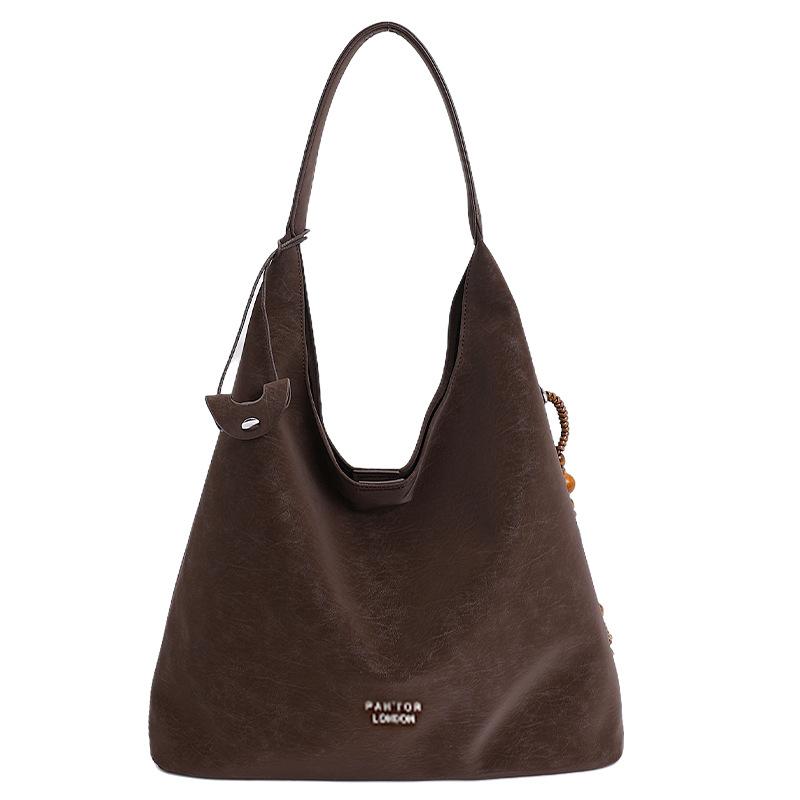 

Commuter tote bag, foreign style shoulder bag 2025 autumn new fashion underarm bag, popular bucket bag коричневый