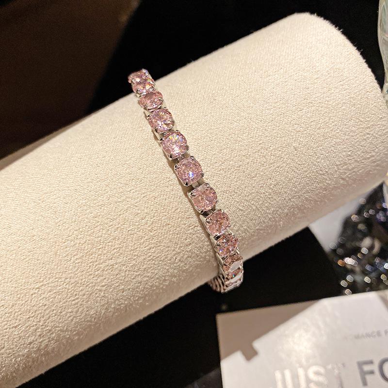 Pink Diamond Zirconia Starburst Flower Bracelet: Trendy, Luxurious Jewelry with Unique Design.