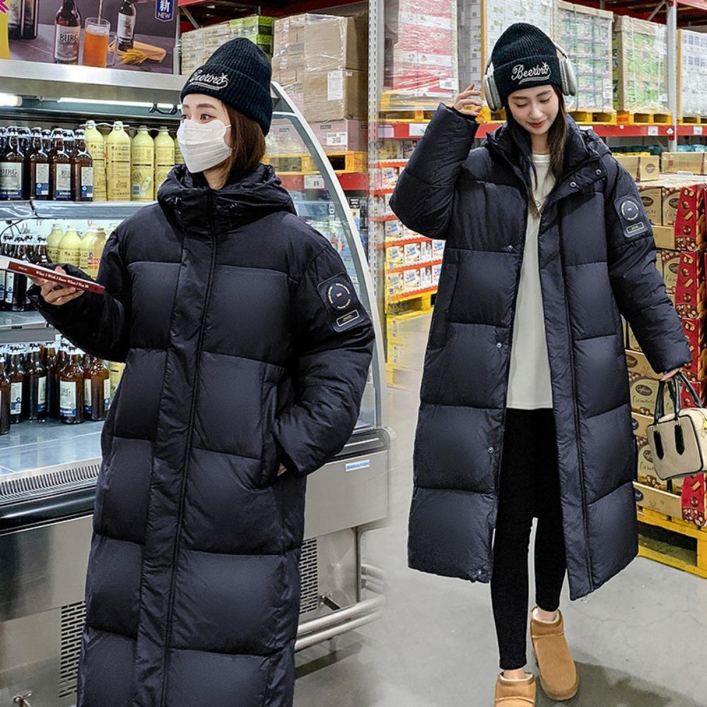 The new Korean version is loose over the knee and thickened long cotton-padded jacket.