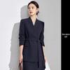 Elegant Coffee-Colored Collarless Skirt Suit for Women with Waist-Cinching Belt - Perfect for Urban Professional Style and Commuting.