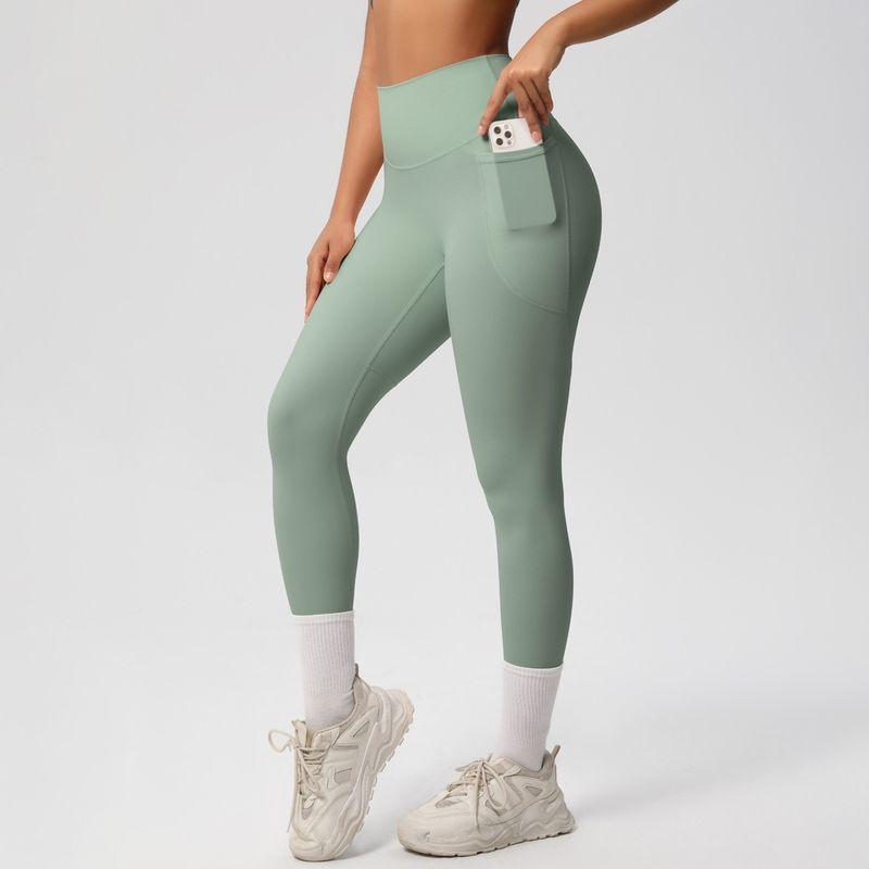Fashion Nude Feel Beauty Back Cross Bubble Wrap Sports Bra High Waist Hip Lift Pocket Sports Yoga Pants Fitness Suit Women