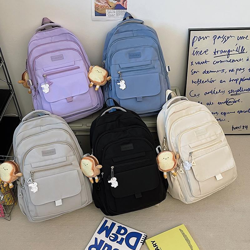 Korean version of simple backpack large capacity junior high school male and female students campus schoolbag backpack light