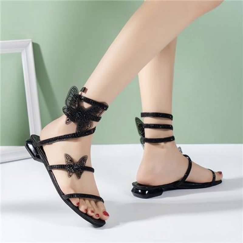 Rhinestone Serpentine Winding Sandals Female Flat Bottom One Word with Low Heel Explosion 2025 New Fairy Wind Roman Crystal Shoes