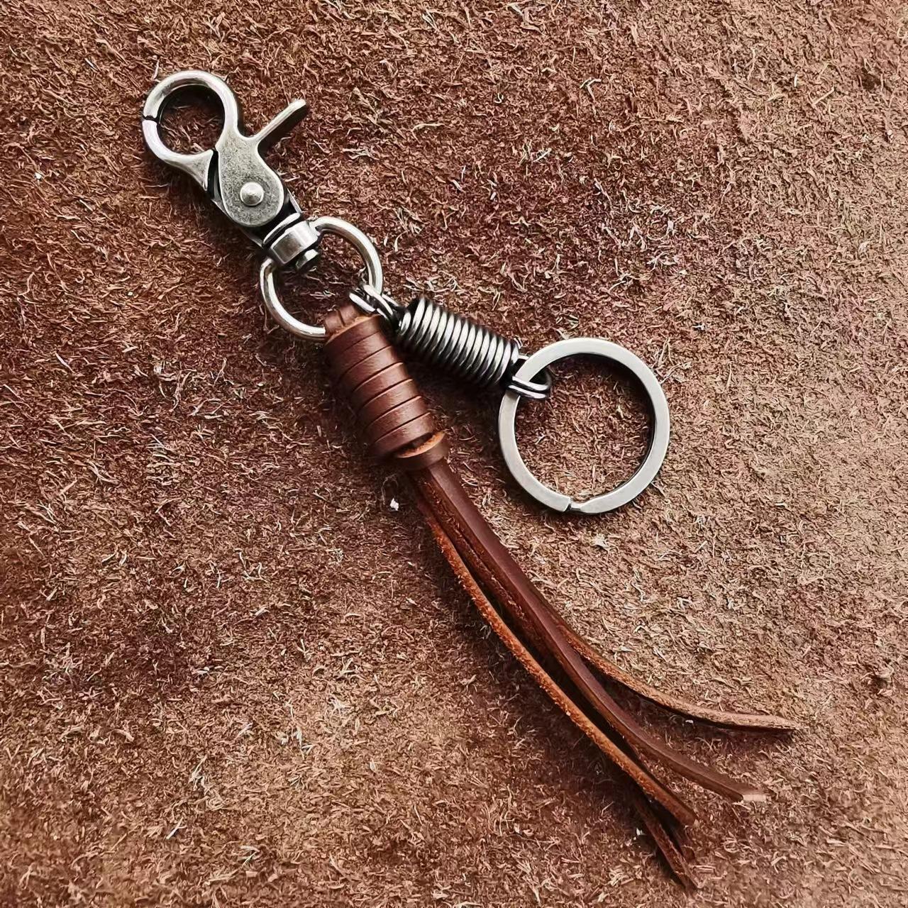 verkoop Koeienhuid Weven Legering Kreeftsluiting Leer Kwast Hanger Tas Accessoires Voor Vrouwen Tas Bedeltje black