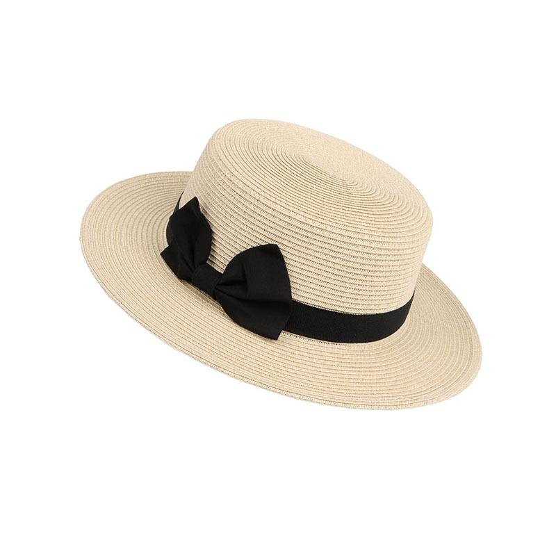 Spring and summer fashion bow flat top straw hat sunshade women versatile new hemming short beach straw hat trend