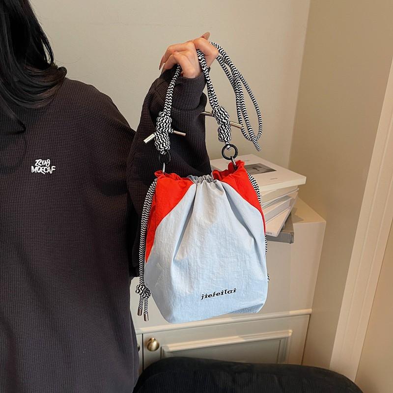 

Korean Shoulder Bag New Style Ins Contrasting Color Drawstring Bucket Simple Casual Cross-border Backpack синій