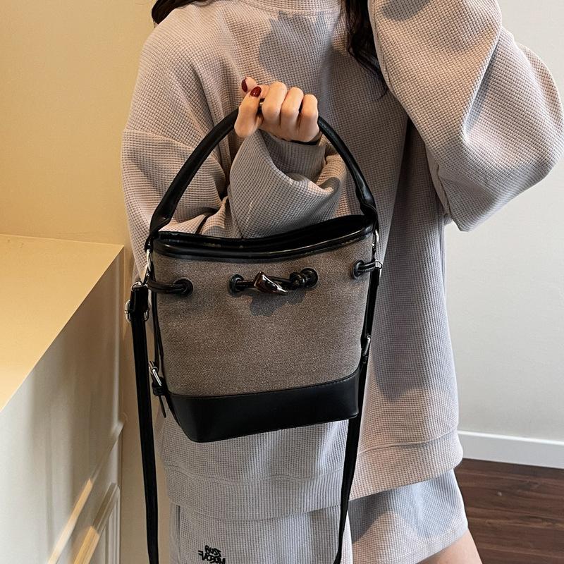 Premium sense simple retro bucket bag women's 2025 summer new messenger bag casual portable shoulder bag