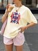 The Cartoon Sardine Letter Printed T-shirt Is a Casual and Versatile Top with a Style Suitable for Daily Neutral and Loose Wear