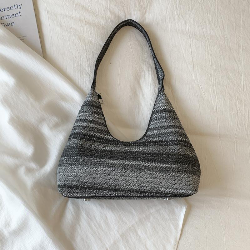 

Contrasting color rainbow strip woven tote bag women s 2025 new seaside straw bag large capacity shoulder armpit bag tide