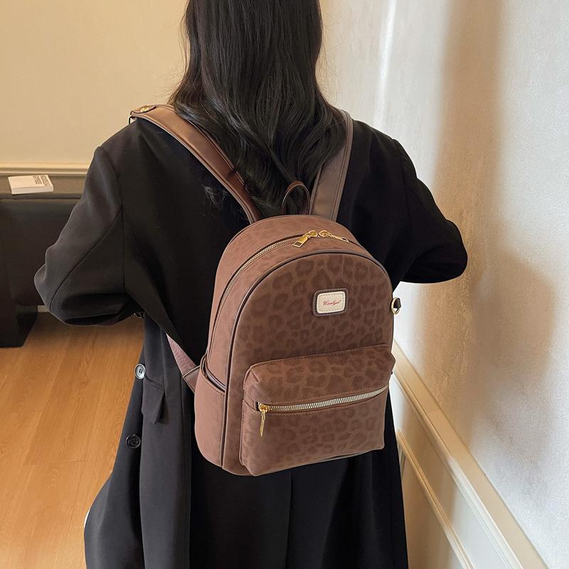 Leopard Print Travel Backpack for Women 2025 New Niche College Students Class Schoolbag Large Capacity Super Fire Commuter Backpack