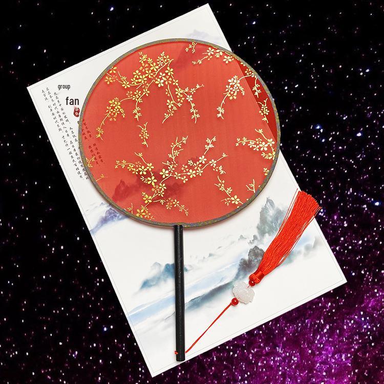 Éventail rond en soie rouge Hanfu ancien, orné d'un long pompon, pour la mariée.