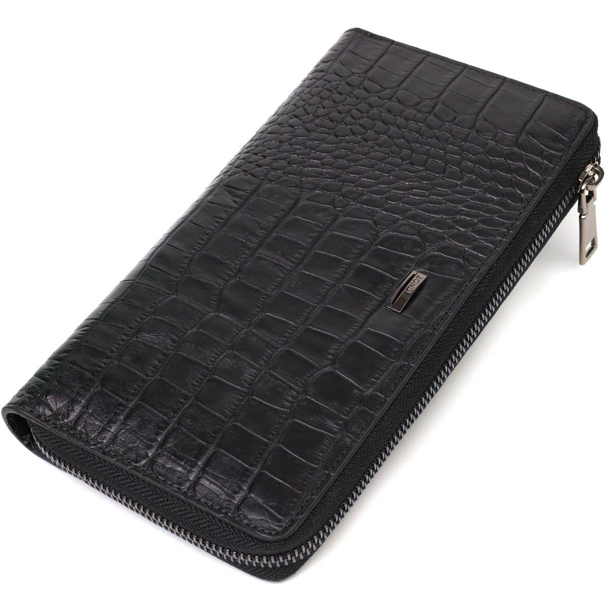 

A solid men s clutch with one compartment made of genuine leather with crocodile embossing BOND-WALLET 22030 Black