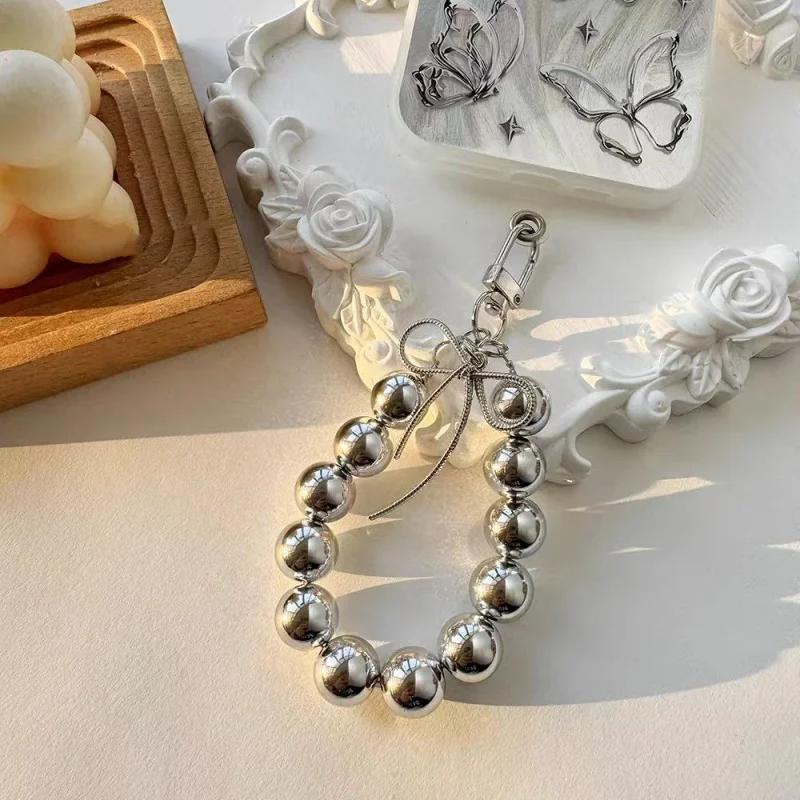 Advanced feeling electroplated silver pearl mobile phone strap, sweet bow headphone case, bag, car key pendant