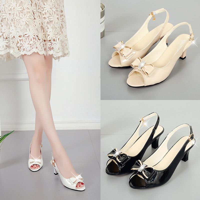 Spring and summer new one-word buckle fashion shut-up large-size women's sandals