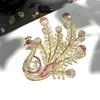 Phoenix Peacock Brooch: High-Quality Copper with Cubic Zirconia, Real Gold Plating.