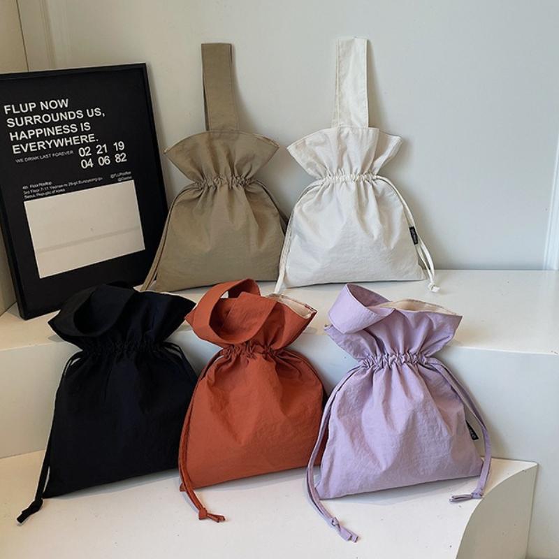 Einfache Handtasche im japanischen Stil für Damen Fashi Knitter-Kordelzug-Kosmetiktasche Vielseitige Taschen für Teenager-Mädchen
