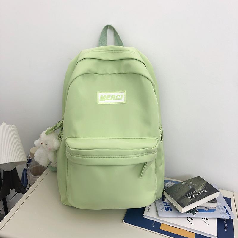 High-value schoolbag female Japanese ins large-capacity backpack solid color high school college student simple backpack