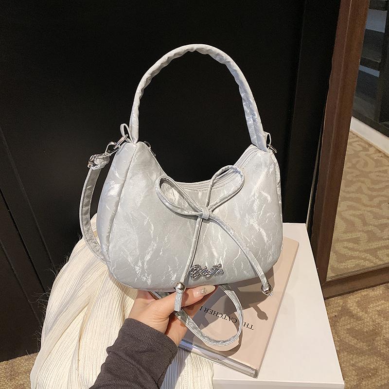 

Solid color 2025 summer new large-capacity bow dumpling bag fashionable versatile underarm shoulder bag women s handbag