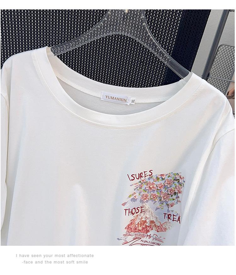 Women's Plus Size Loose Fit Mid-Length Round Neck T-Shirt with Short Sleeves and Slimming Design.