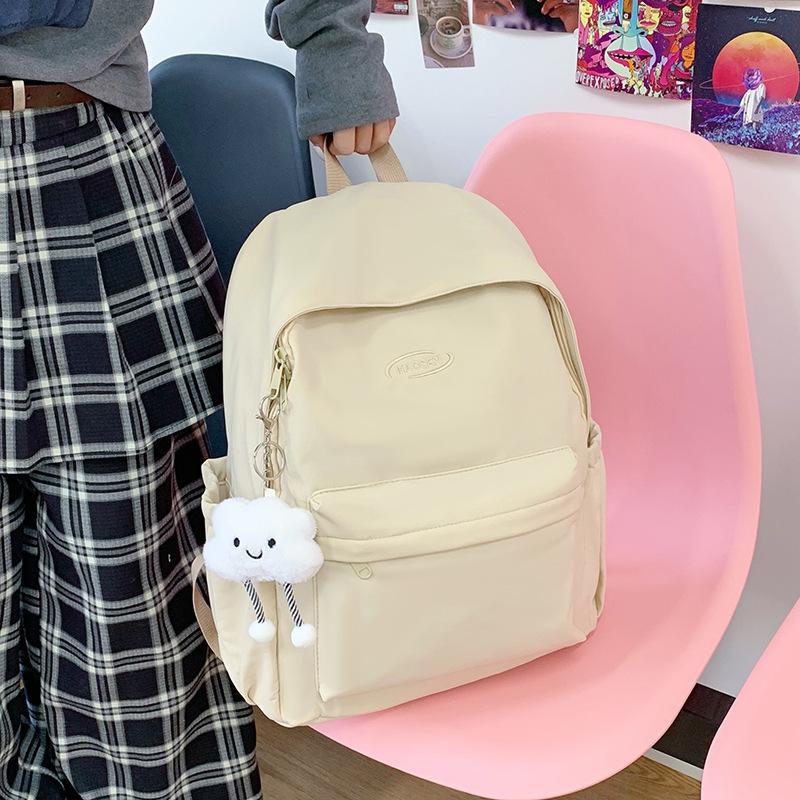 A Simple and Fashionable Backpack with A Large Capacity and A High-quality Texture. It Is A School Bag for Senior High School Students