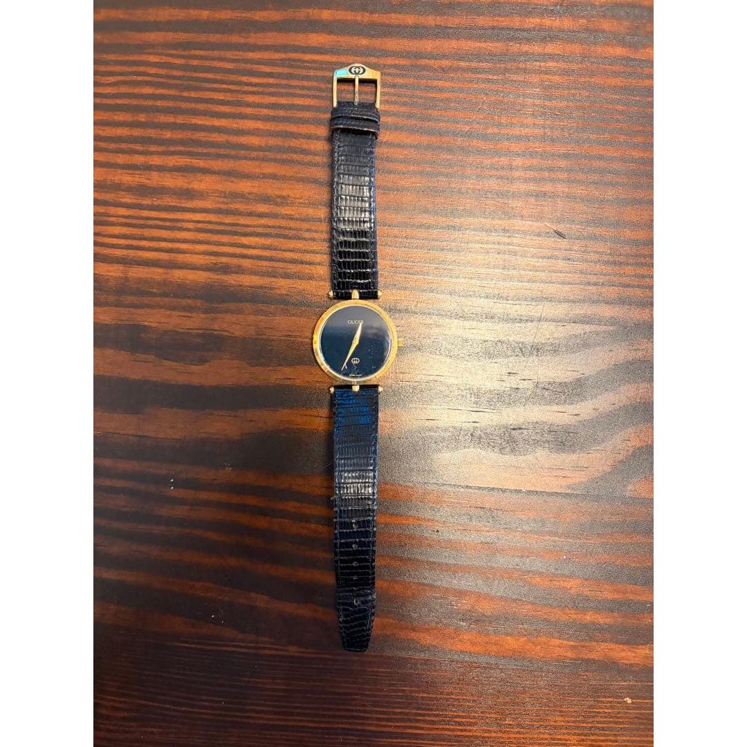 Used GUCCI watch quartz navy dial gold