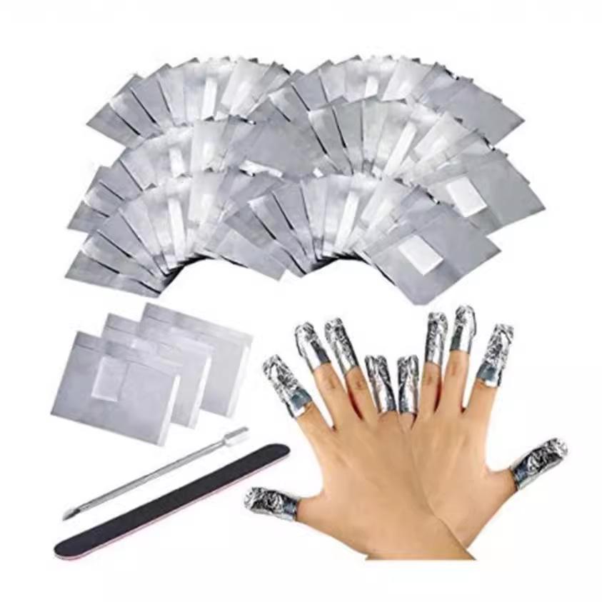 

Nail Art Tools Set - 100 Foil Wraps, Steel Pusher & File. 100 pieces