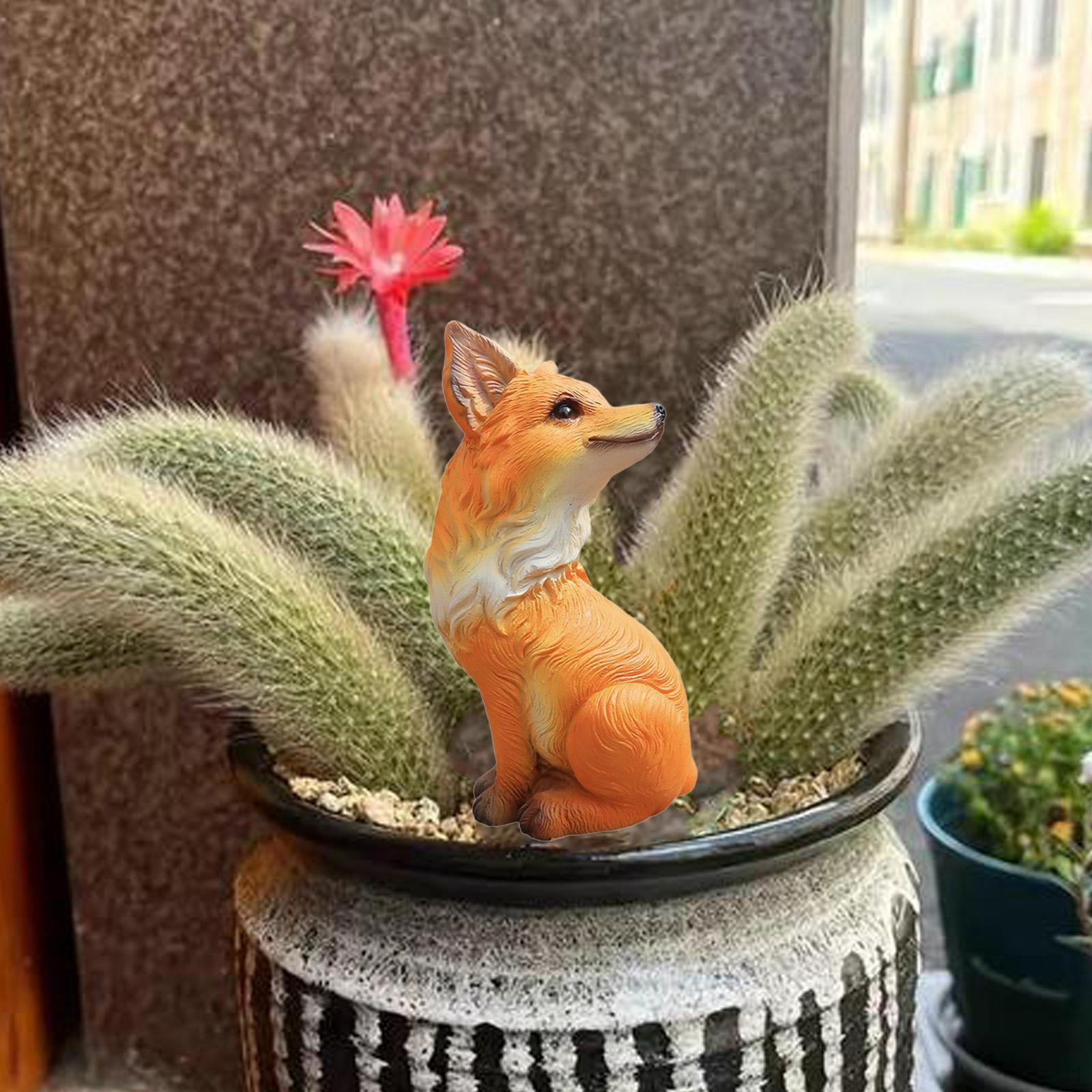 

Очаровательная статуэтка лисы для наружного декора дома Looking Back Orange
