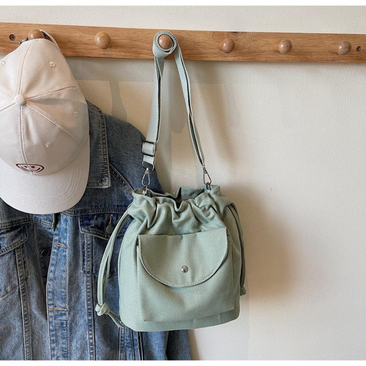 Canvas Bag Women's Spring and Summer New Niche Drawstring Shoulder Messenger Bag Pleated Bucket Bag