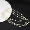 Korean Long Pearl Necklace: Trendy Multi-layer Hollow Flower Sweater Chain for Women
