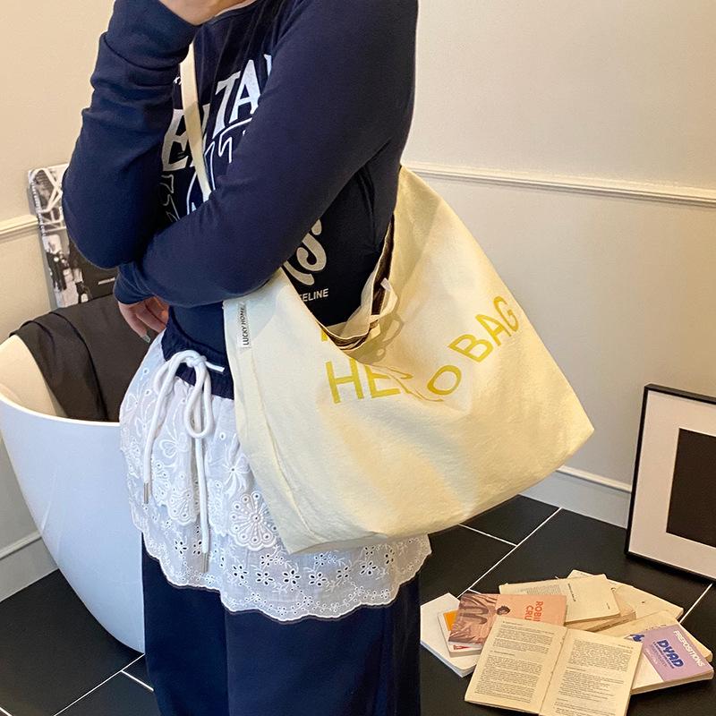

Korean version women s bag 2025 canvas tote bag literary and retro large-capacity letter shoulder bag double-sided messenger bag 42*18*32